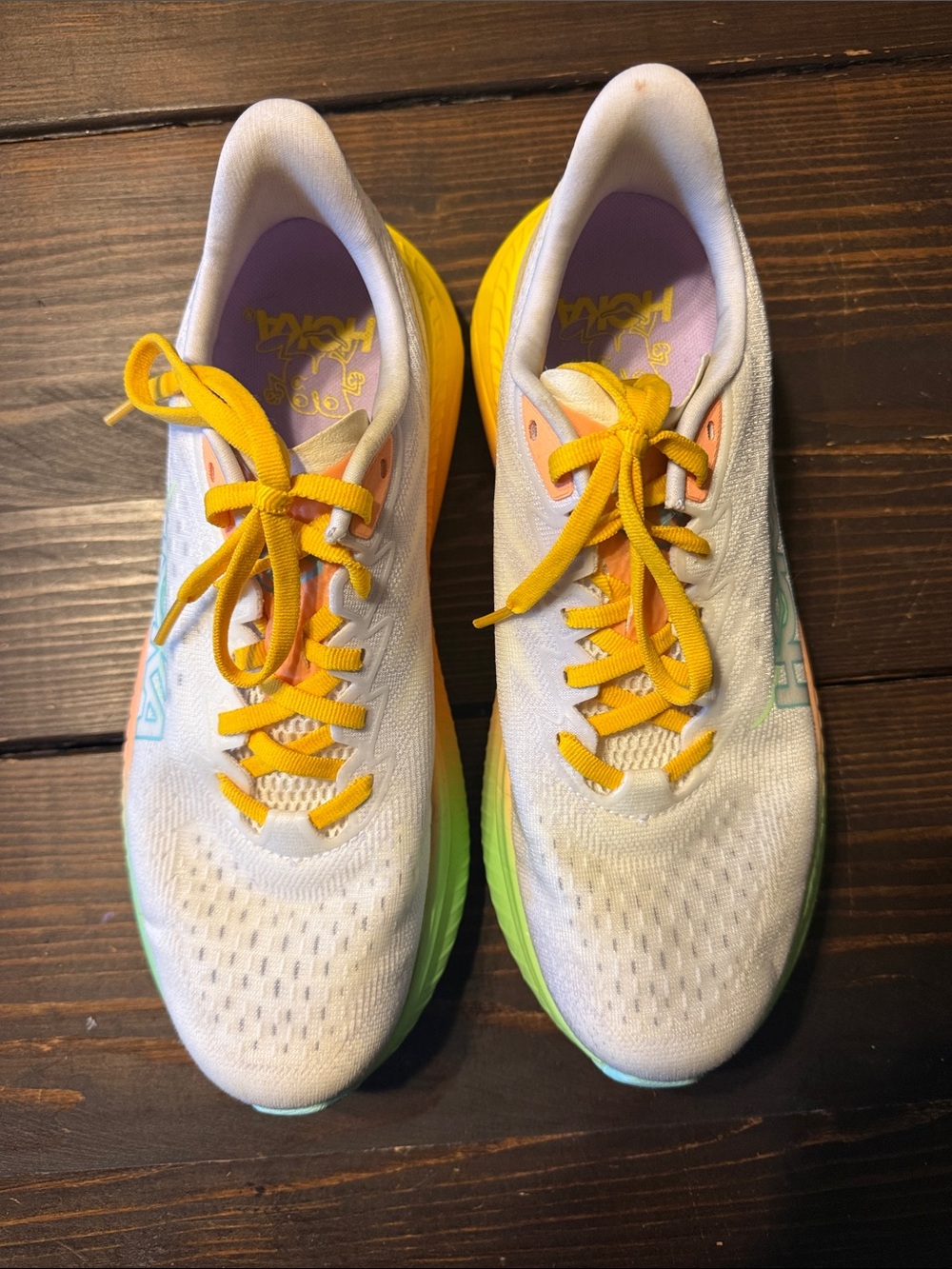 Hoka Women's White Running Shoes with Yellow Laces and Green Midsoles
